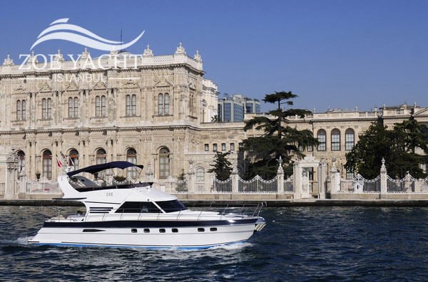 Zoe Yacht cruising by Dolmabahce Palace in Istanbul