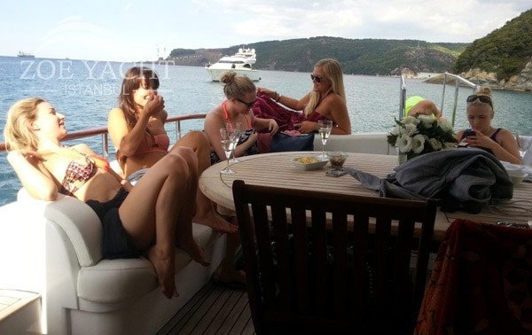 Relaxing on board with drinks from the bar